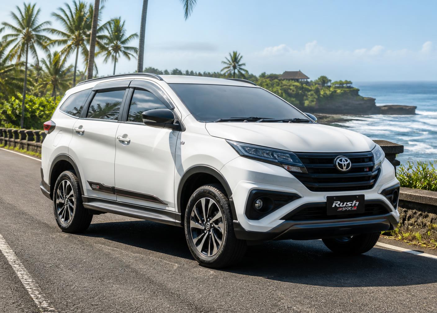 White Toyota Rush GR Sport 2025 SUV parked on a Bali coastal road